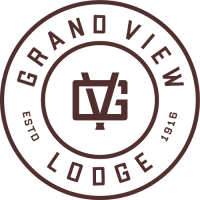 Circular logo for Grand View Lodge with initials "GVL" in the center and text "ESTD 1916" on the outer ring.