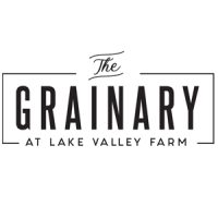 Logo with text: "The Grainary at Lake Valley Farm" in bold, black, capital letters on a white background.